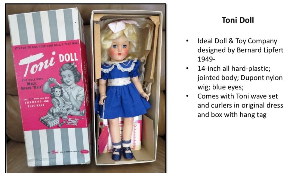One Doll Wax Statue Inside A Box With AN Image