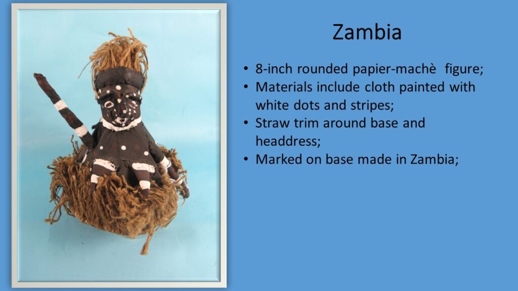 Zambia straw trim Doll Description Slide