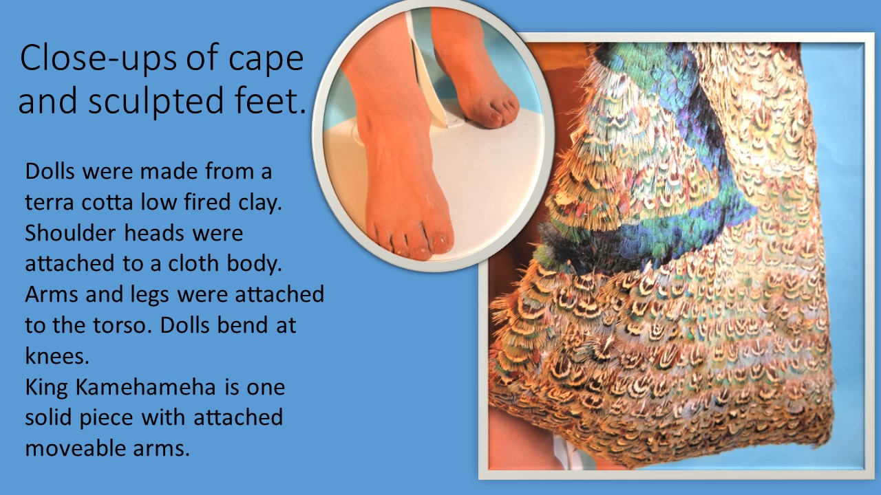 closeup of cape and sculpted feet description